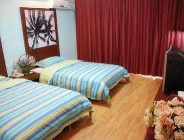 Xinlong Holiday Hotel Цзяочжоу Екстер'єр фото